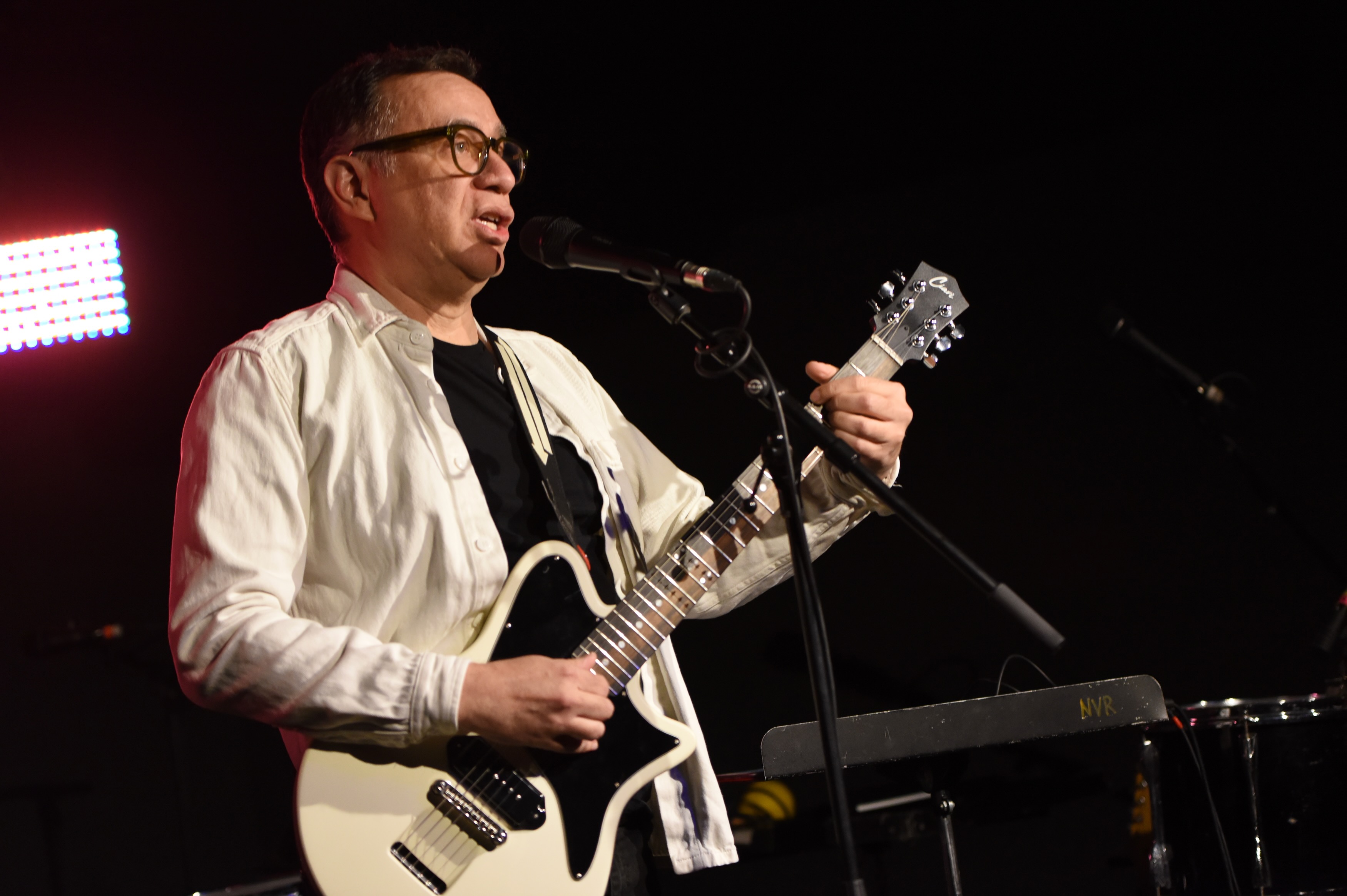Fred Armisen performing on tour